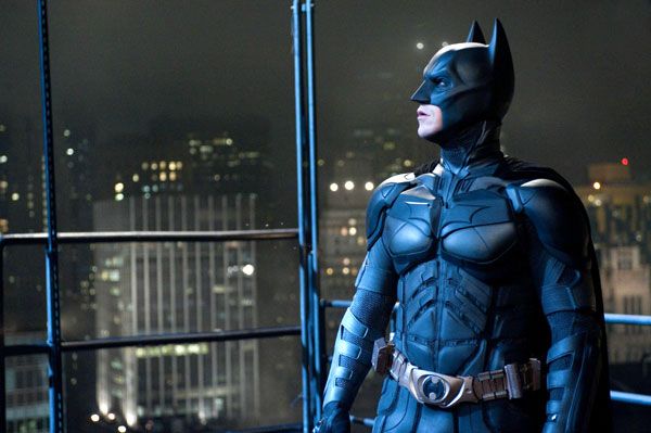 Batman (Christian Bale) stares at an unseen danger in THE DARK KNIGHT RISES.