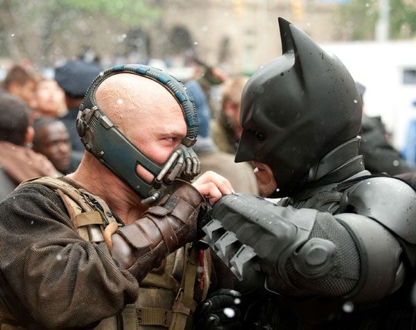Bane and Batman duke it out in THE DARK KNIGHT RISES.