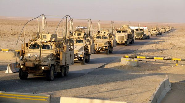 The last vehicles in a U.S. Army convoy cross the border from Iraq into Kuwait, on December 18, 2011.