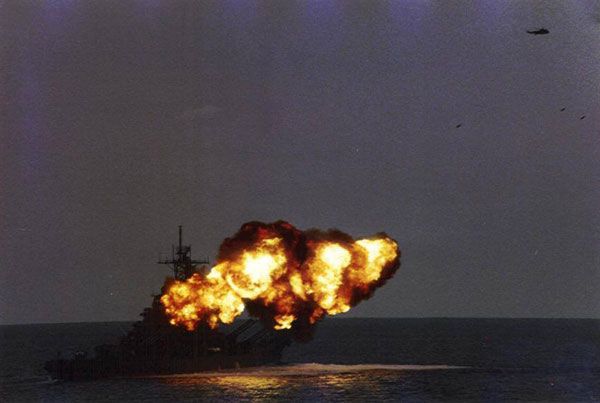 The USS Iowa fires her 16-inch guns during a naval exercise in 1987.
