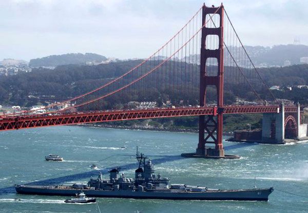 The USS Iowa passes underneath the Golden Gate Bridge as the battleship embarks on a final trip to SoCal, on May 26, 2012.