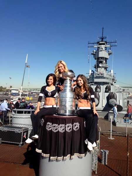 The Los Angeles Kings' Ice Crew poses with the Stanley Cup aboard the USS Iowa in San Pedro, on January 16, 2013.