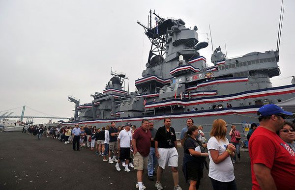 A long line forms as people wait to board the USS Iowa at San Pedro's Berth 87 on July 7, 2012.