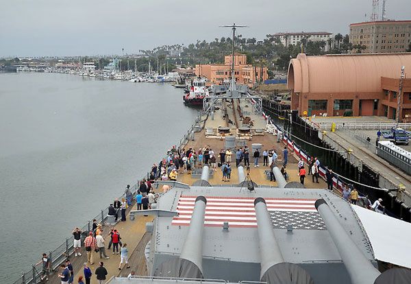 A crowd gathers on the USS Iowa's bow after it officially became a floating museum at San Pedro's Berth 87, on July 7, 2012.