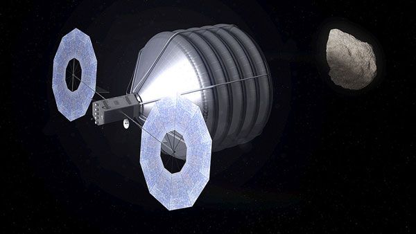 An artist's concept of NASA's asteroid retrieval spacecraft approaching a Near-Earth Object. An artist's concept of NASA's asteroid retrieval spacecraft approaching a Near-Earth Object.