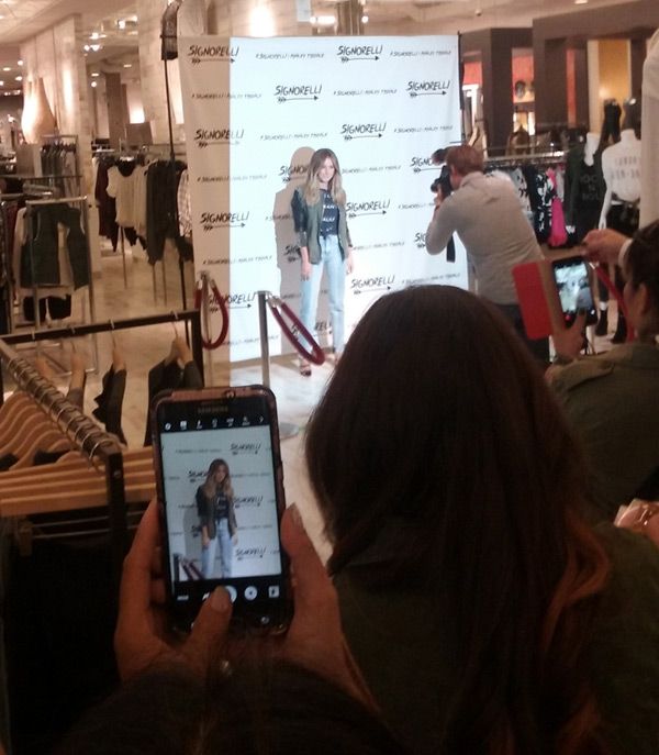 Ashley Tisdale poses for the cameras before doing a meet-and-greet at the Bloomingdale's department store in Santa Monica...on September 10, 2016.