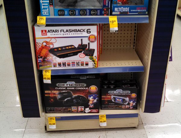 Classic Atari and Sega Genesis game consoles on sale at my local Walgreens store...on November 15, 2015.