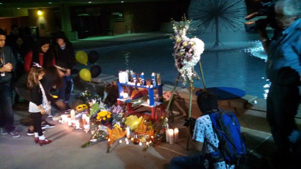 Flowers, candles and other items are placed near the Lyman Lough fountain at CSULB's Brotman Hall...in honor of Nohemi Gonzalez on November 15, 2015.