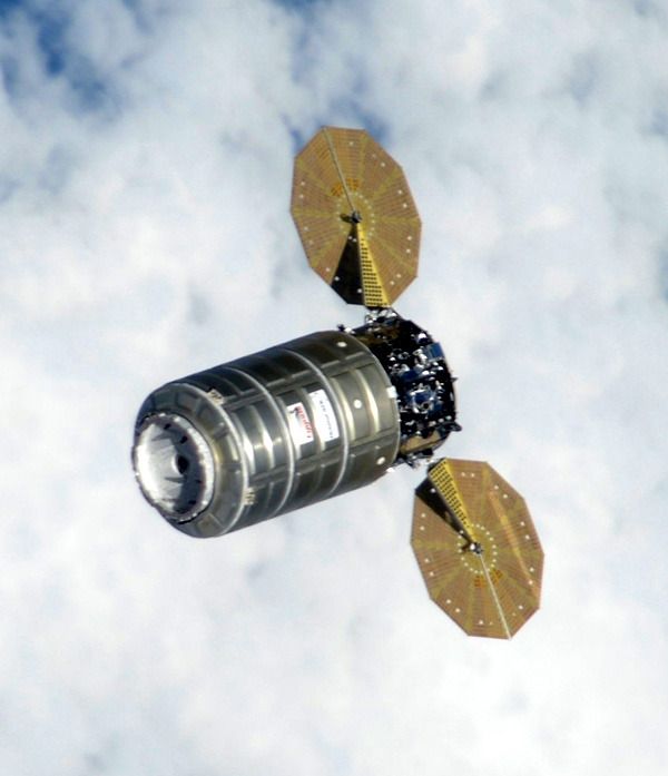 Cygnus Orb-4 (also known as the 'S.S. Deke Slayton II') floats near the ISS as its robotic arm (not visible) waits to grapple the cargo freighter on December 9, 2015. Cygnus Orb-4 (also known as the 'S.S. Deke Slayton II') floats near the ISS as its robotic arm (not visible) waits to grapple the cargo freighter on December 9, 2015.
