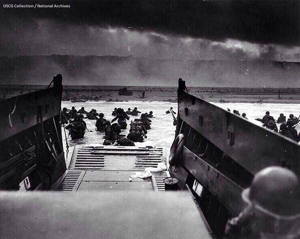 An archival photo showing Allied soldiers approaching the beaches at Normandy, France, during D-Day in World War II...on June 6, 1944.