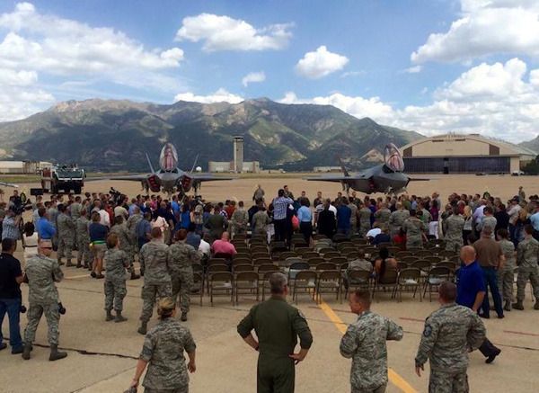 Military personnel gather for a press conference as the first two of 72 F-35A jet fighters are delivered to Hill Air Force Base in Utah...on September 2, 2015.