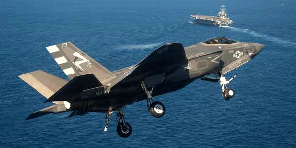 The F-35C Lightning II approaches the USS Nimitz...prior to becoming the first Joint Strike Fighter jet to make an arrested landing aboard an aircraft carrier, on November 3, 2014.
