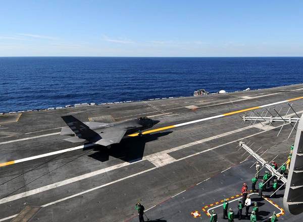 The F-35C Lightning II touches down on the USS Nimitz on November 3, 2014...marking the first time a Joint Strike Fighter jet made an arrested landing aboard an aircraft carrier.