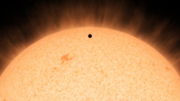 An artist's concept of the exoplanet HD 219134b transiting its parent star.