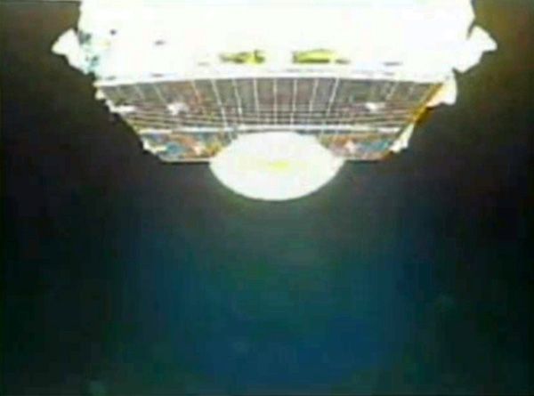 A camera aboard the H-IIA rocket captured this image of the Hayabusa 2 spacecraft shortly after payload fairing jettison during launch...on December 3, 2014 (Japan time).