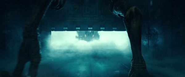 As the cell door rises, Thomas Whitmore (background) prepares to confront an alien prisoner in INDEPENDENCE DAY: RESURGENCE. As the cell door rises, Thomas Whitmore (background) prepares to confront an alien prisoner in INDEPENDENCE DAY: RESURGENCE.