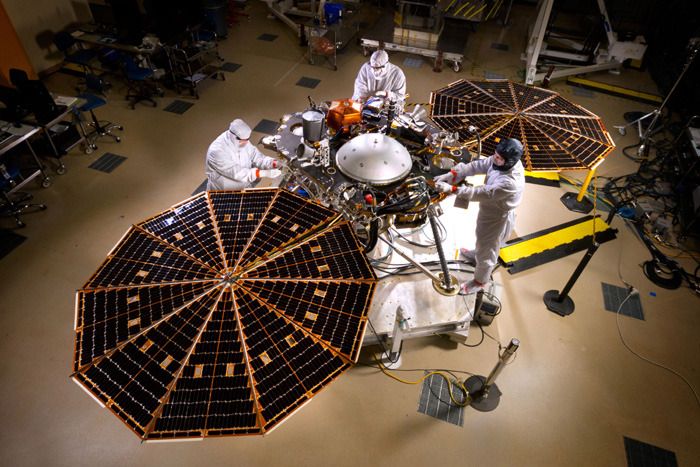 Engineers work on NASA's InSight Mars lander at the Lockheed Martin facility in Denver, Colorado...on April 30, 2015.