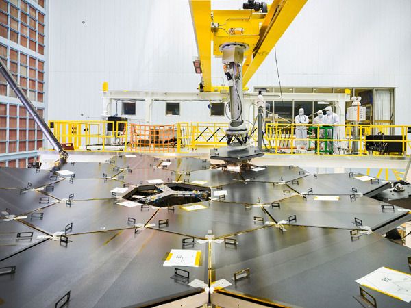 The last of 18 primary mirror segments is about to be installed onto the James Webb Space Telescope at NASA's Goddard Space Flight Center in Greenbelt, Maryland...on February 3, 2016.