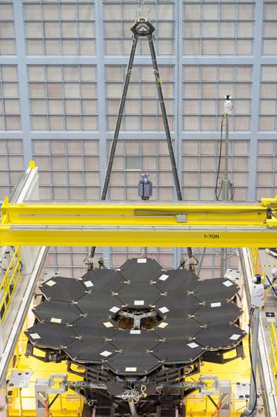 The last of 18 primary mirror segments is installed onto the James Webb Space Telescope at NASA's Goddard Space Flight Center in Greenbelt, Maryland...on February 3, 2016.
