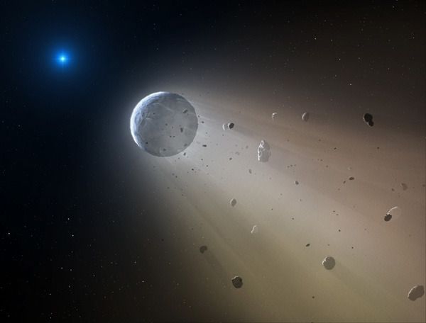 An artist's concept of a rocky object, discovered by NASA's Kepler spacecraft, being torn to pieces by a white dwarf star.