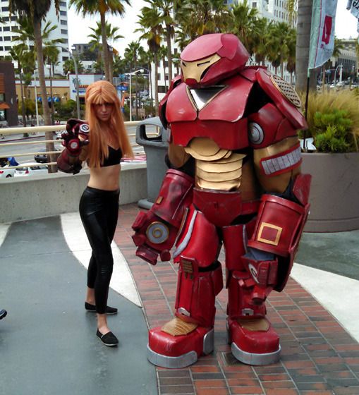 Cosplayers dressed as Pepper Potts from IRON MAN 3 and the Hulkbuster from AVENGERS: AGE OF ULTRON strike a pose at Long Beach Comic Con...on September 12, 2015.