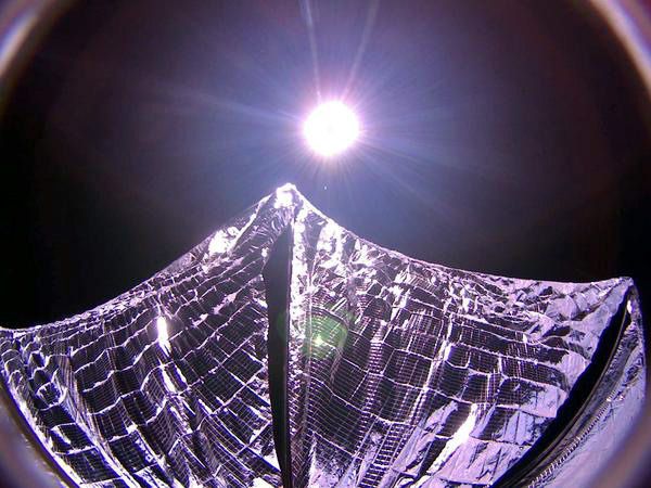 An image that was taken of the LightSail spacecraft's solar sail one day after it was successfully deployed...on June 7, 2015.