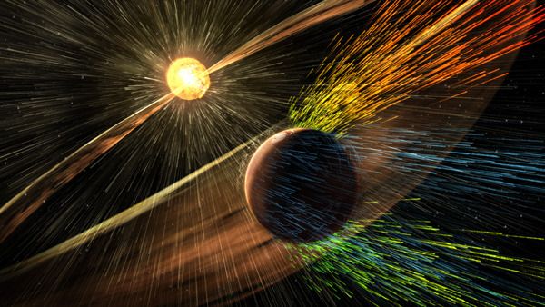 An artist’s concept of a solar storm hitting Mars and stripping ions away from the Red Planet's upper atmosphere.