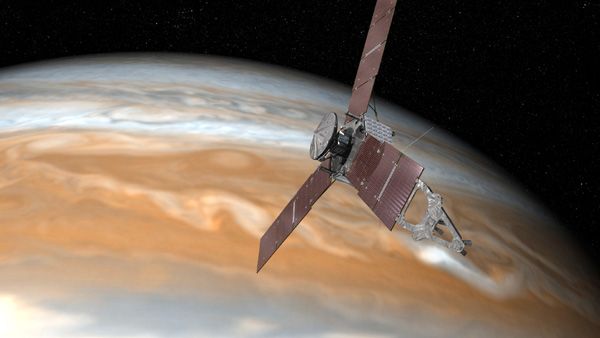An artist's concept of NASA's Juno spacecraft orbiting Jupiter.