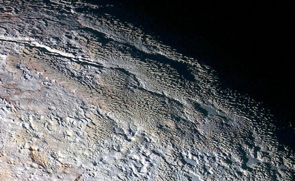 A high-resolution, enhanced-color image of Pluto's Tartarus Dorsa region that was taken by NASA's New Horizons spacecraft on July 14, 2015.