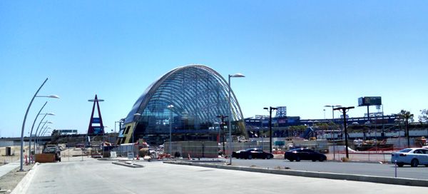 A new Metro bus station undergoing construction in Orange County...with Angel Stadium of Anaheim visible in the background.
