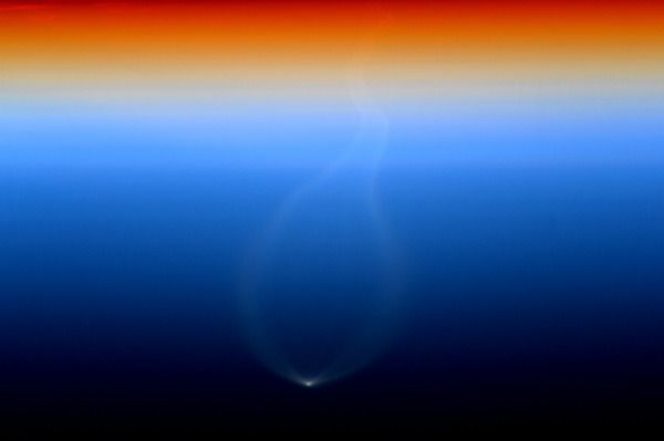 As seen from aboard the International Space Station, the rocket plume of the Atlas V carrying the Cygnus spacecraft is visible while the launch vehicle leaves Earth's atmosphere on December 6, 2015...beginning the Orb-4 mission. As seen from aboard the International Space Station, the rocket plume of the Atlas V carrying the Cygnus spacecraft is visible while the launch vehicle leaves Earth's atmosphere on December 6, 2015...beginning the Orb-4 mission.