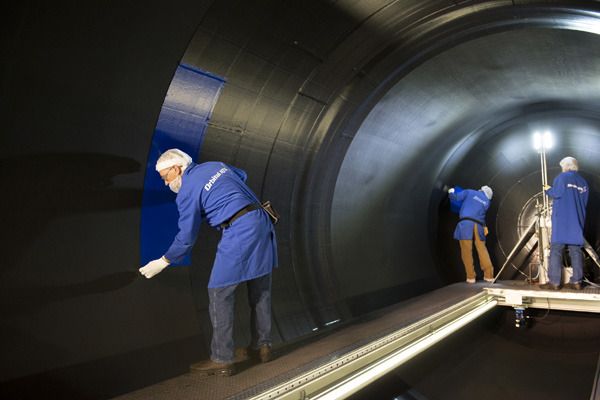 Orbital ATK engineers install insulation to the rear segment of the SRB for the QM-2 ground test...set to take place in Utah early next year. Orbital ATK engineers install insulation to the rear segment of the SRB for the QM-2 ground test...set to take place in Utah early next year.