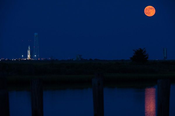 A full moon lights up the night sky as the Antares rocket carrying the Cygnus Orb-2 spacecraft stands poised for launch at NASA's Wallops Flight Facility in Virginia, on July 12, 2014. A full moon lights up the night sky as the Antares rocket carrying the Cygnus Orb-2 spacecraft stands poised for launch at NASA's Wallops Flight Facility in Virginia, on July 12, 2014.