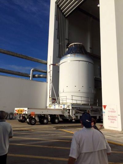 At NASA's Kennedy Space Center in Florida, the Orion EFT-1 spacecraft is rolled out of the Neil Armstrong Operations and Checkout Building prior to being transported to the Payload Hazardous Servicing Facility...where Orion will be loaded with fuel in preparation for its maiden flight into space this December. At NASA's Kennedy Space Center in Florida, the Orion EFT-1 spacecraft is rolled out of the Neil Armstrong Operations and Checkout Building prior to being transported to the Payload Hazardous Servicing Facility...where Orion will be loaded with fuel in preparation for its maiden flight into space this December.