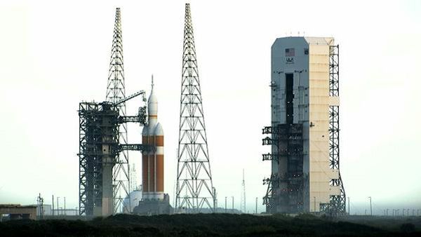 The Delta IV Heavy rocket carrying the Orion EFT-1 spacecraft stands poised for launch (which was scrubbed) at Cape Canaveral Air Force Station in Florida...on December 4, 2014.