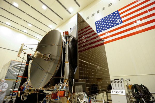 NASA's OSIRIS-REx spacecraft completes assembly after technicians install the probe's high-gain antenna and twin solar arrays...at the Lockheed Martin facility near Denver, Colorado.