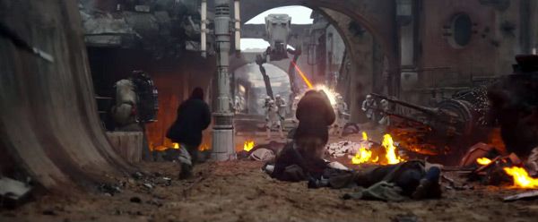 A squad of Stormtroopers and an AT-ST walker attack a Jedha village in ROGUE ONE: A STAR WARS STORY. A squad of Stormtroopers and an AT-ST walker attack a Jedha village in ROGUE ONE: A STAR WARS STORY.