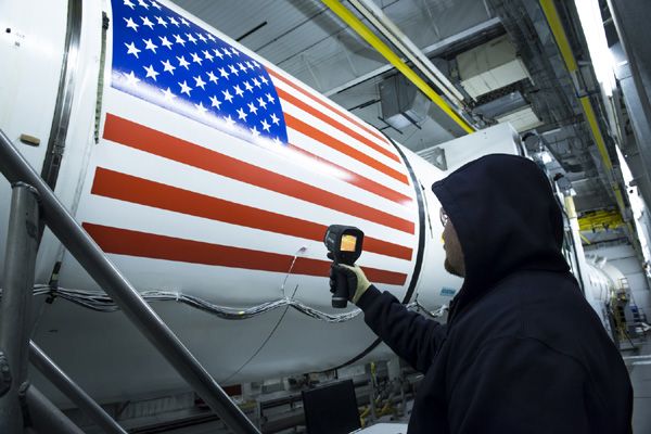 An Orbital ATK engineer checks the temperature of the propellant inside the solid rocket booster that will be fired during the qualification motor test in Utah...on June 28, 2016. An Orbital ATK engineer checks the temperature of the propellant inside the solid rocket booster that will be fired during the qualification motor test in Utah...on June 28, 2016.