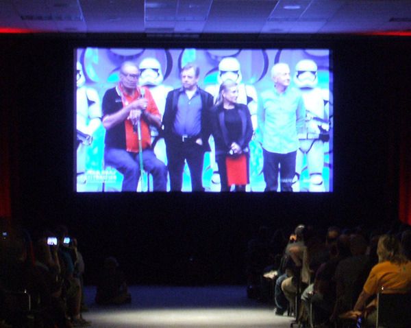 Original Trilogy actors Peter Mayhew, Mark Hamill, Carrie Fisher and Anthony Daniels are flanked by Stormtroopers from THE FORCE AWAKENS at the Star Wars Celebration in Anaheim, California...on April 16, 2015.