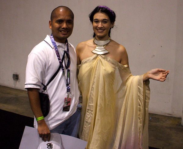 Posing with a fan dressed as Padmé Amidala from ATTACK OF THE CLONES at the Star Wars Celebration in Anaheim, California...on April 16, 2015.