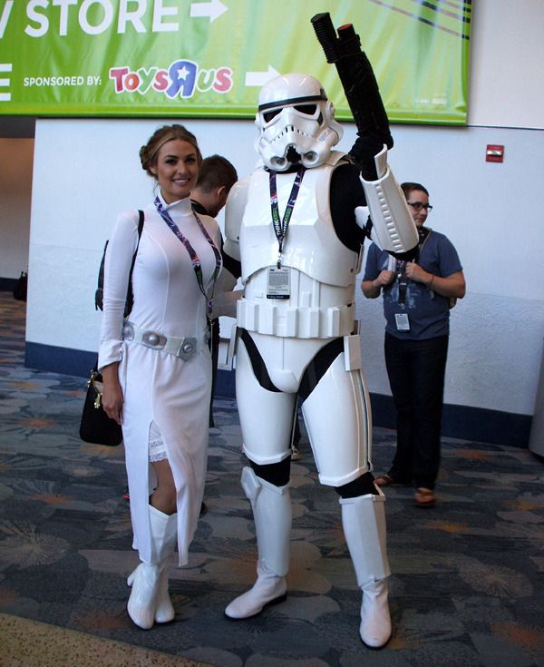 Fans dressed as Princess Leia and a Stormtrooper strike a pose at the Star Wars Celebration in Anaheim, California...on April 16, 2015.