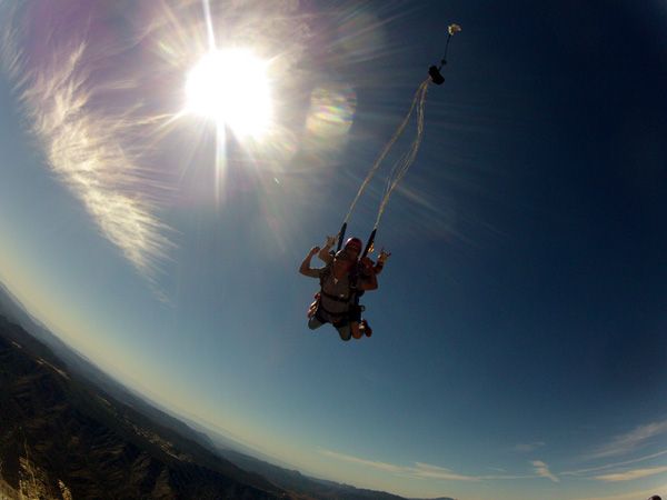 The parachute is deployed above Lake Elsinore, CA, on October 4, 2014.