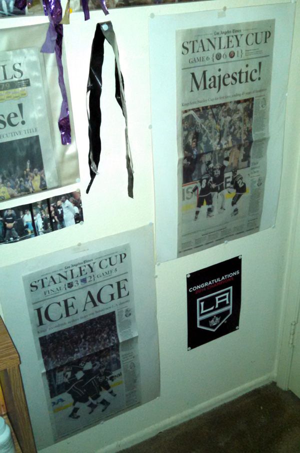 The Los Angeles Times sports pages commemorating the L.A. Kings' Stanley Cup wins from 2012 and this year, respectively.