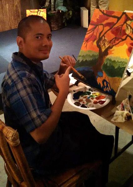 Painting a spooky tree at a restaurant in Huntington Beach...on October 23, 2015.