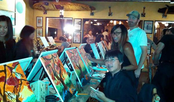 My friends and I paint spooky trees at a restaurant in Huntington Beach...on October 23, 2015.