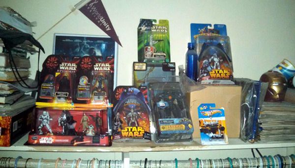 My STAR WARS action figures and other collectibles inside my closet at home.