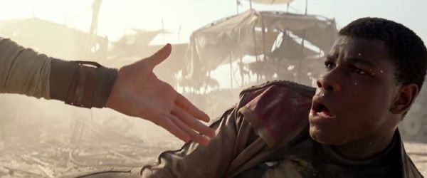 Rey comes to Finn's aid in STAR WARS: THE FORCE AWAKENS. Rey comes to Finn's aid in STAR WARS: THE FORCE AWAKENS.