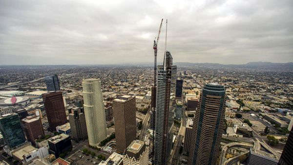 The Wilshire Grand Center stands tall in downtown Los Angeles after the final spire segment was installed atop the skyscraper on September 3, 2016.