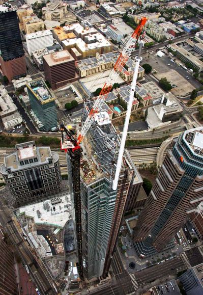 The final spire segment is about to be installed atop the Wilshire Grand Center on September 3, 2016.