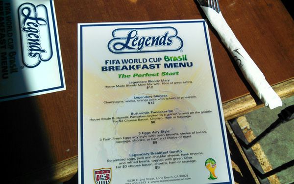 Grabbing a bite to eat at the Legends sports bar in Long Beach, CA, before the start of the World Cup final game in Brazil...on July 13, 2014.